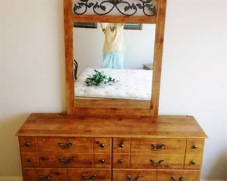 $350.  CONRAD PINE DRESSER WITH MIRROR.   Email us or call 512-954-3050  to buy it now or make an offer.