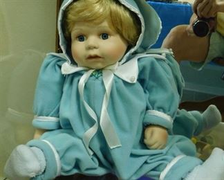 $20.  PORCELAIN DOLL.