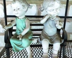 $10.  BOY AND GIRL ON BENCH GARDEN STATUARY. 