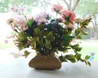 $5.  FAUX FLORAL ARRANGEMENT.