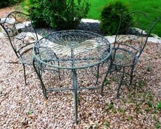 $200.   WROUGHT IRON BISTRO SET.  Email us or call 512-954-3050  to buy it now or make an offer.