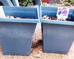 $10.  PAIR OF PLASTIC SQUARE POTS.  9" TALL.  9" DIAMETER.