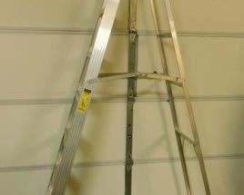 $65.  8 FOOT WERNER LADDER.