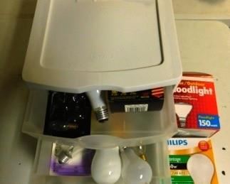 $25.  CONTAINER OF ASSORTED LIGHTBULBS.