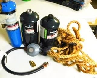 $30.  FIRE EXTINGUISHER, FULL PROPANE BOTTLES, ROPE AND HOSE.