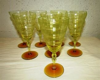 Auction #26 ...Vaseline glass (they glow),  set of 8 wine glasses ... made by Utility Glass Works in Maryland for their "Cambodia" line ... yellow tops on amber bases... fluted pattern ...  rare! ... Opening bid: $10