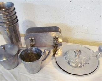 Auction#44 ... Hammered aluminum dinnerware (9 pcs.), including "butler" on right. ... min bid: $5