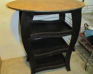 Auction#46 ...  Work table with storage shelves ... refinished top ... brass rails on shelves ... 38" tall .. paint finish ... an interesting artsy piece ... 