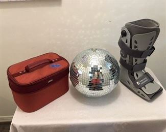 Samsonite Cosmetic Bag $12 ; Disco Ball $18 ; Medical Boot $32