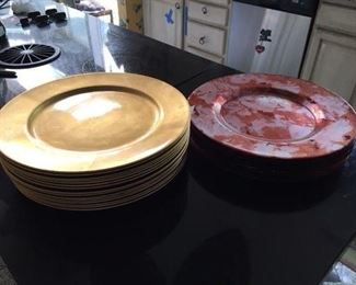 Set of 16 Gold Chargers, Plastic $60; Set of 7 glass Mottled Chargers $30. Neither food safe!