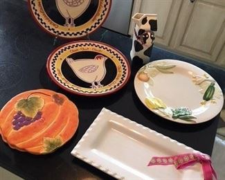 S/2 Chicken Plates by Becky Danny $16; Moo Pitcher $10; Portuguese Veggie Plate $10; Pair Pumpkin Trivets $8; Ribbon Platter $10