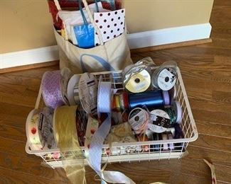 Large Bag of Gift Bags and Tissue Paper with Wire Rack Over Flowing with Ribbons $25