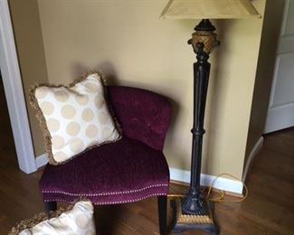 Plum Upholstered Occasional Chair $35; Pair of Beautiful Cream and Gold Pillows $35; Resin Standing Lamp $55