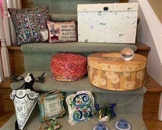 Jazzy Pillow $6; Needlepoint Pillow $4; Paperwork Case $4; Recycled Paper Box $4; Set of 2 Hat Boxes $6; Tole wall mounted Container $5; Bless Pillow $3 ; Small Candlestick $3; Needlepoint pillow $4; Bead Work violets in ceramic Swan $8 ;  Pair Wedgwood Jasperware Candlesticks $14 ; Waterford Crystal Tennis Ball $10