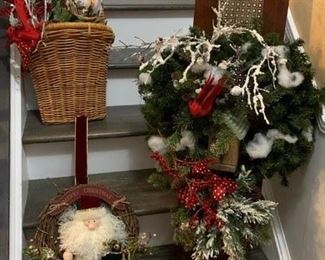 Hanging Basket w Christmas Garland $10 ; Hanging Plaque from Antique Wood Decorated w Bird House & Christmas Sprigs $25 ; Santa Grape Vine Wreath w Hanger $10