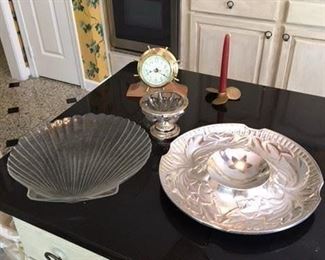 Brass Captains Wheel Clock with Brass Propeller Candle Holder $10; Chrome and Glass Small Pedestal Dish $5; Glass Shell Form Dish $10; Wilton Pewter Chip and Dip Tray $18