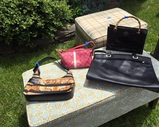 Ferragamo bag $300; pink Coach bag $20; Dooney Bourke alligator black bag $40; large Coldwater Creek black bag $20