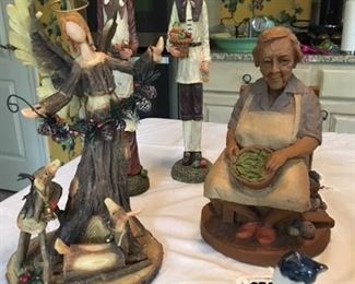 Pair of primitive pilgrims $15; woodland angel $14; Tom Clark “Nellie” figurine $40; lovely porcelain kitty $8