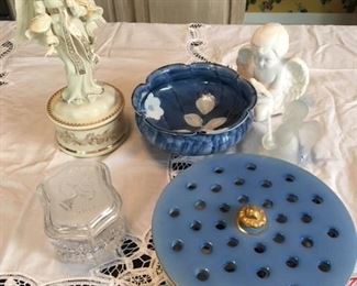 Lenox angel music box $55; Waterford 2002 $18; Japanese lobed bowl $25; unmarked kneeling angel $16; Frosted glass angel $6; porcelain flower arranger $16