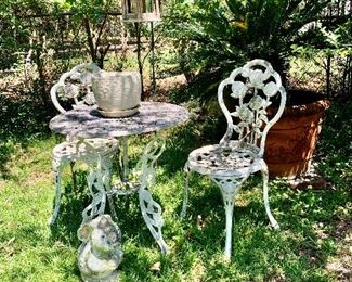 Vintage wrought iron patio furniture set, excellent condition. large outdoor pots/plants and cement figurines.