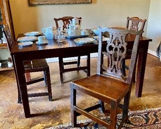 Four 18th century Continental Chippendale style side/dining chairs