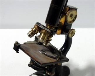 Bausch & Lomb Microscope With Brass Head Lenses And Adjustment Knobs