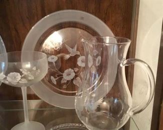 Pitcher, glass and hummingbird plate