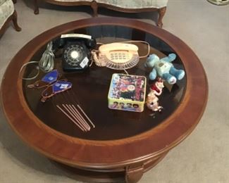 Miscellaneous on glass top wooden coffee tablr