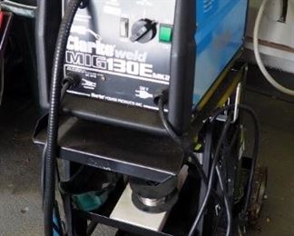 Clarke Weld Gas MIG Welder, Model WE6510, 130E MK2, Includes Firepower Rolling Cart, Compression Tanks, Wire, And Instruction Manual
