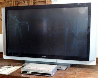 Sony XBR 60 Inch Flat Screen HD Television And Sony DVD/VHS Player, TV Powers On