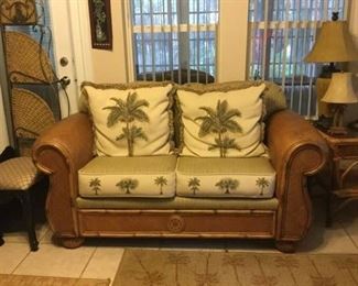 Tommy Bahama-style loveseat (65" x 35" x 31") and end table (28" x 21" x 24") $350