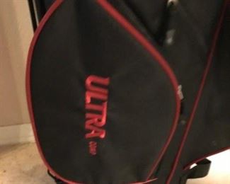 Like New, Used Once! Graphite shaft wood  Wilson Ultra golf clubs with 3 head covers and  standing golf bag. Includes: Driver, 3 & 5 wood, Hybrid, 5, 6, 7, 8 9 and PW irons, and Putter.  ($199 retail new) Our price: $135