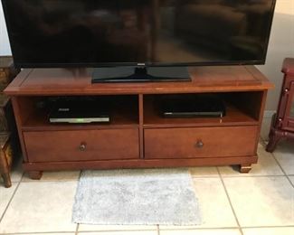 TV stand w/electronic compartments and 2 storage drawers $35