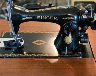 Running condition antique Singer sewing machine and cabinet