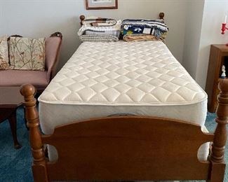 Pair of matching maple twin beds, includes mattress and boxsprings