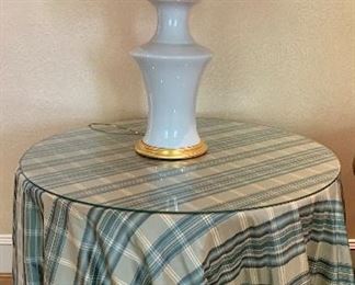 $250 Round glass topped table with custom silk taffeta tablecloth and long fringe.  28" H x 36" W.  Sturdy particle board table.  