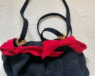 $30 Nancy Bacich black evening bag with red ribbons