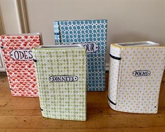 $120 for set of 4 decorative, book shaped vases