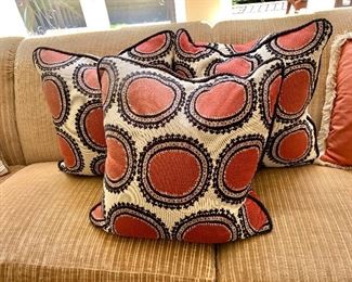 $150 for three down filled, corded pillows; 22" square; minor fading