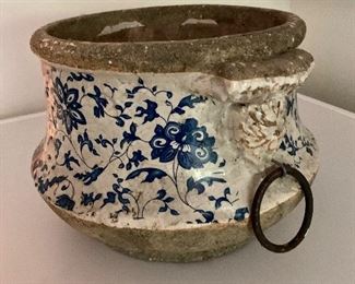 $48 Blue and White cement planter with round iron pulls.  Approx 12 inches in diameter.
