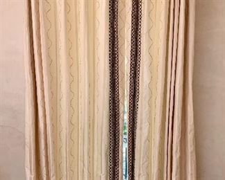 $800 one pair thermally lined draperies; embroidered silk moire stripe with knotted serpentine stripes and loop trim.  Pinch pleats with scalloped top.  Hardware NOT included.
