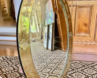 $145 oval, beveled Venetian style mirror; 32Hx22W