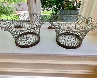 $125 Pair of wire baskets.