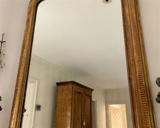 Second photo -  46" x 34" 19th Century Louise Phillipe gilt wood mirror with arched top.