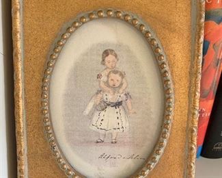 Two of two Sweet prints of children in gold tone frames Framed 8.75"H x 6.75"W