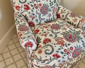 Detail:  Rolled arm skirted chair