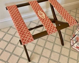 $125 Embroidered needlepoint luggage rack 