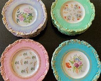 $30 Each set of 4 serpentine, floral plates in Lavender, Green, Pink and Blue 8.5" diameter each