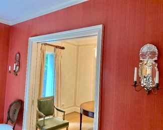 $850 PAIR. Two arm brass mirror backed sconces.  Approx 20" H. 