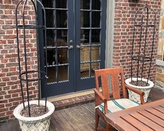 $395 each. Concrete planters with metal trellis (2 available)
